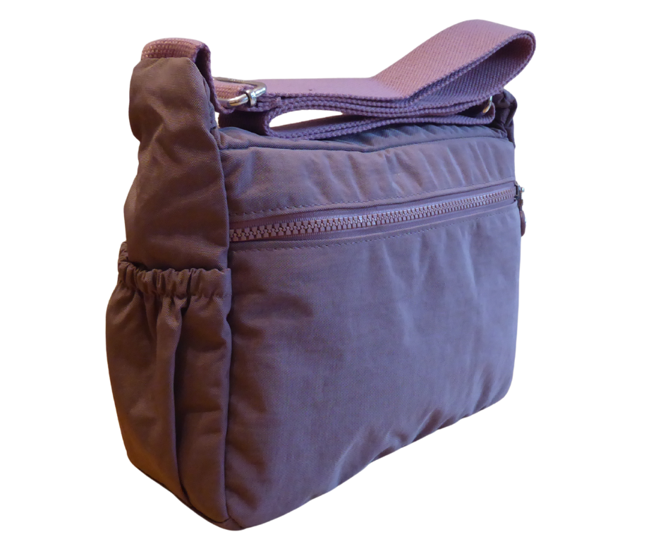Nylon crossbody bag rear left angle – showing rear zip pocket and adjustable strap