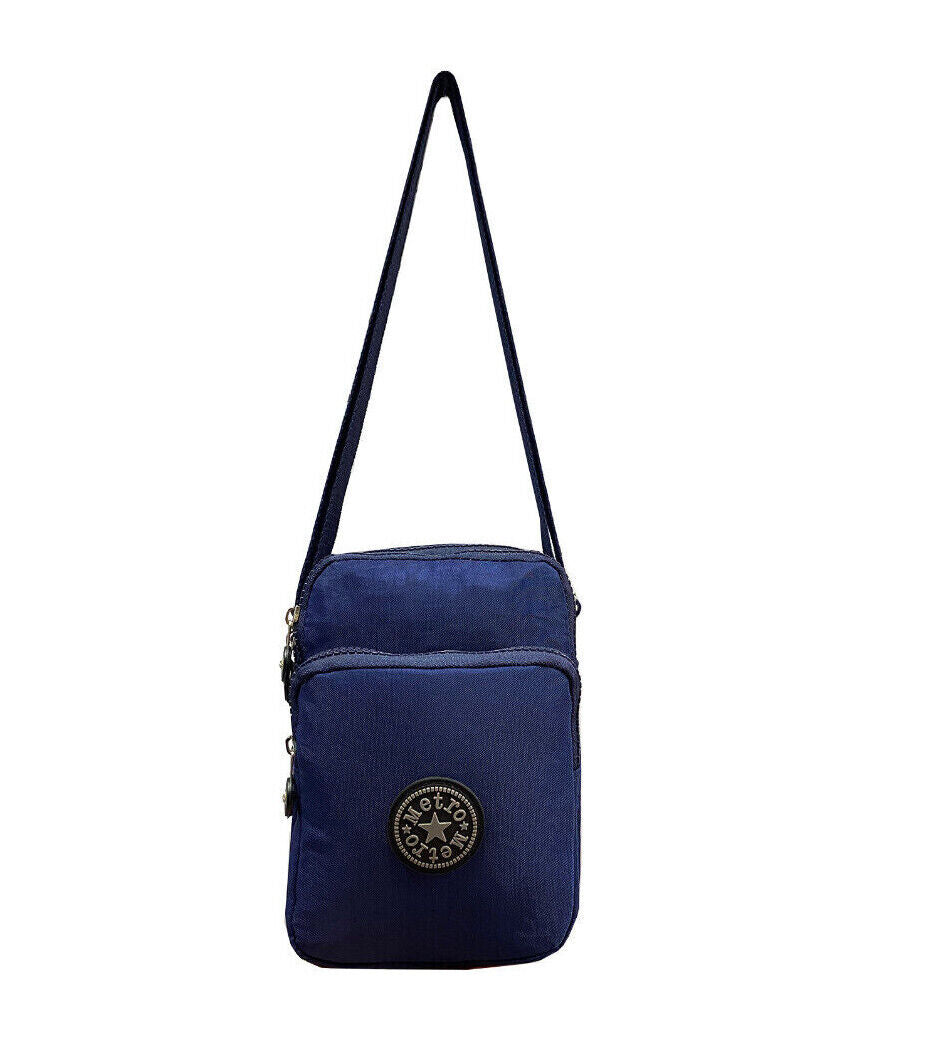 A navy blue fabric crossbody bag with a single shoulder strap, a front zippered pocket, shown against a plain white background.