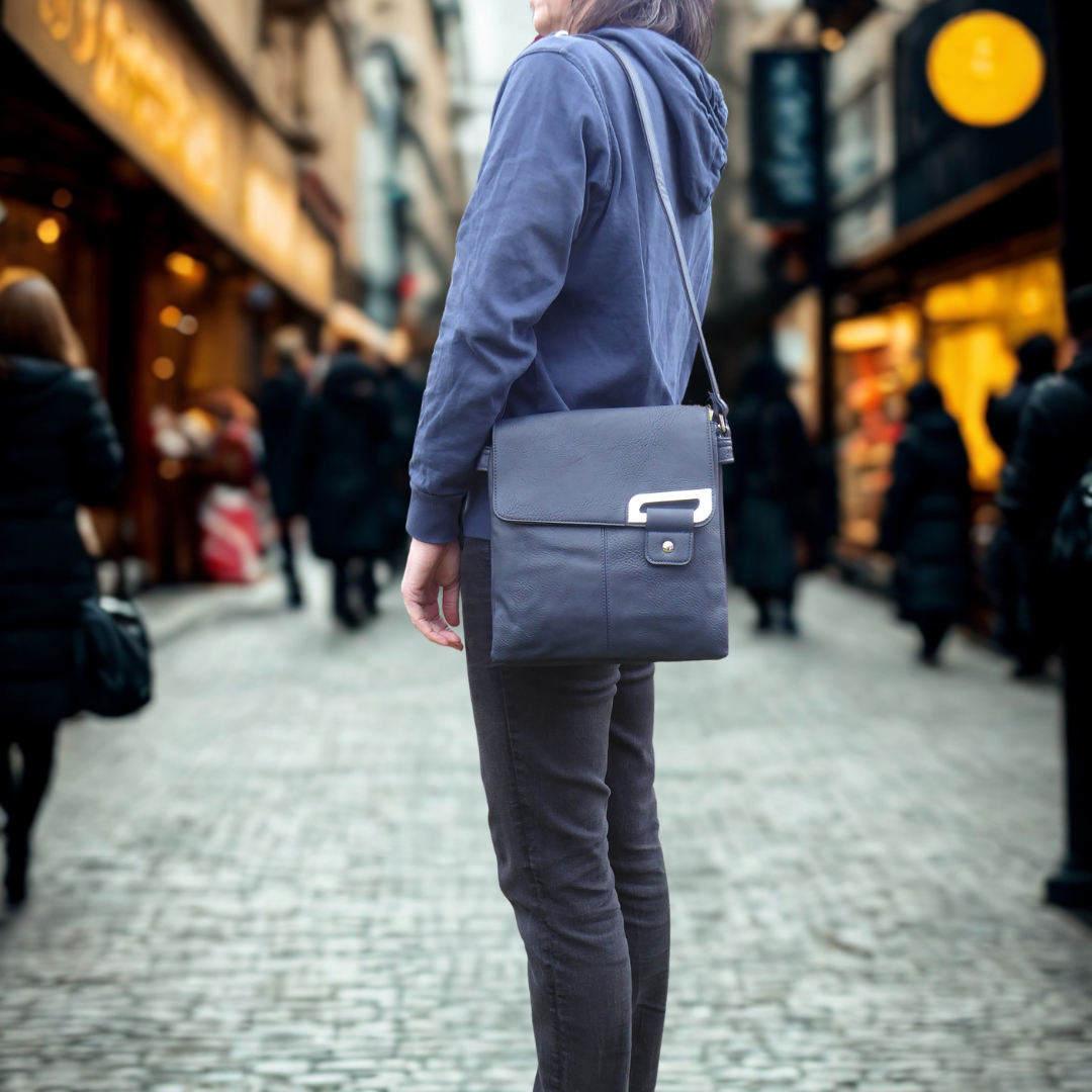 Front buckle crossbody shoulder bag — close-up buckle detail