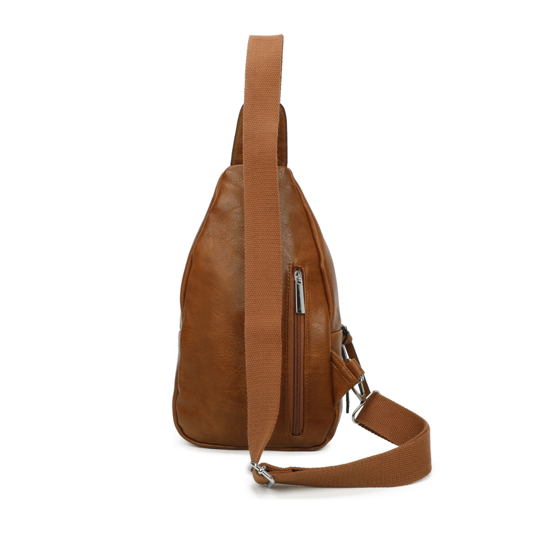 Brown leather crossbody sling bag — angle view