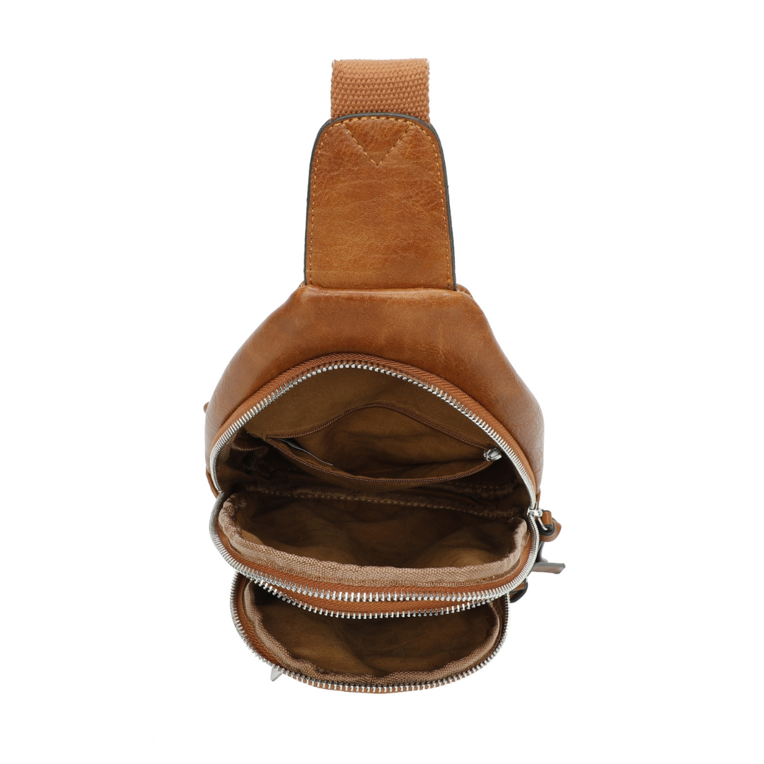 Brown leather crossbody sling bag — rear view