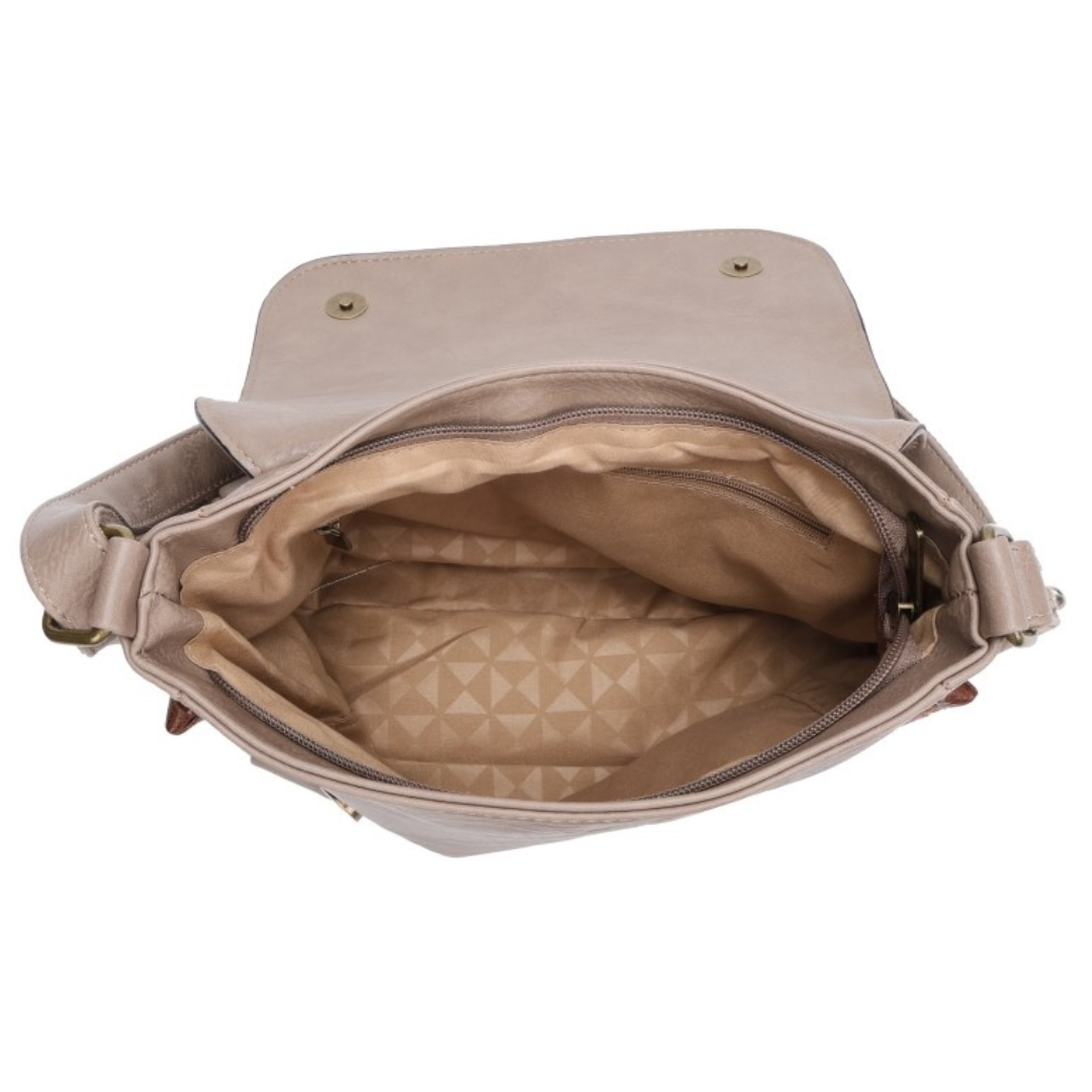 Interior of leather-look vegan crossbody bag showing internal zip pocket and two open pockets