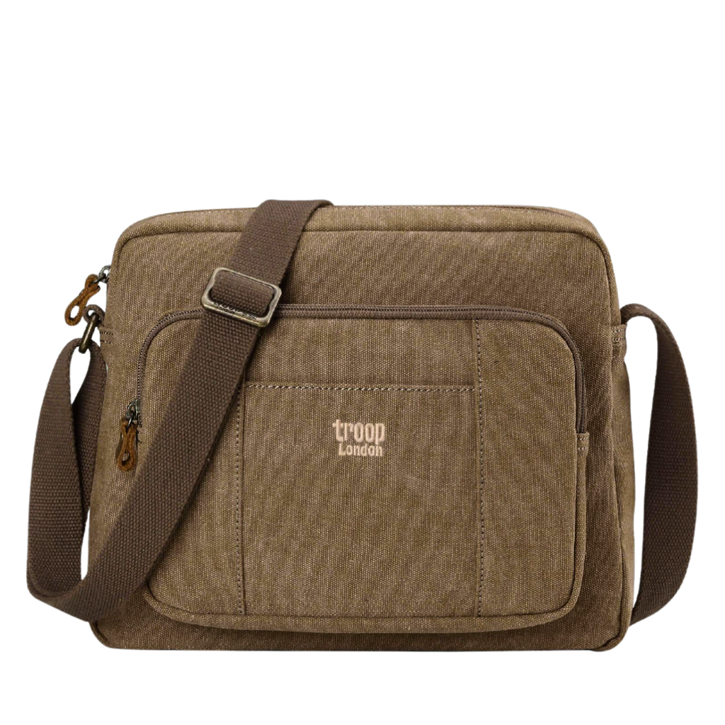 Brown Troop London Large Canvas Cross-body Bag - A4 Size & Brass Hardware with a brown adjustable shoulder strap, and a small tan 'troop London' logo on the front pocket, shown against a plain white background.