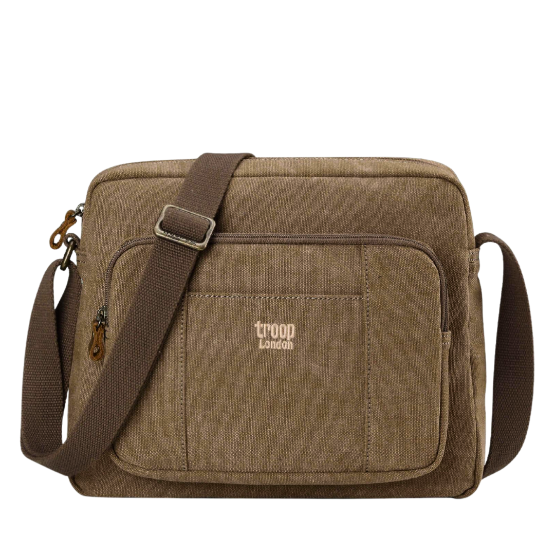 Brown Troop London Large Canvas Cross-body Bag - A4 Size & Brass Hardware with a brown adjustable shoulder strap, and a small tan 'troop London' logo on the front pocket, shown against a plain white background.