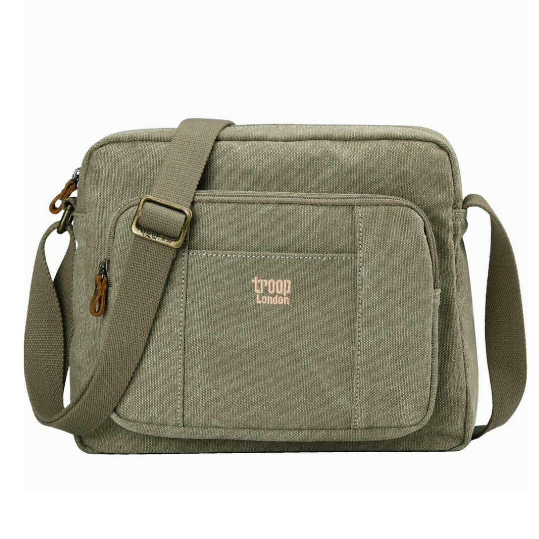 Khakl green Troop London Large Canvas Cross-body Bag - A4 Size & Brass Hardware with an adjustable shoulder strap, and a small tan 'troop London' logo on the front pocket, shown against a plain white background.