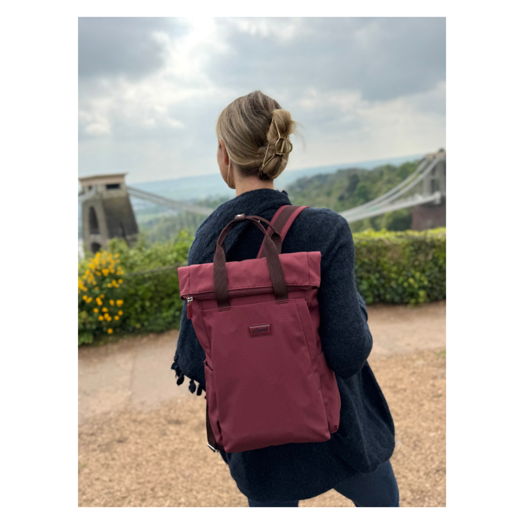 Spirit Eco Roll Top Backpack - Lightweight & Water Resistant - person wearing on their back